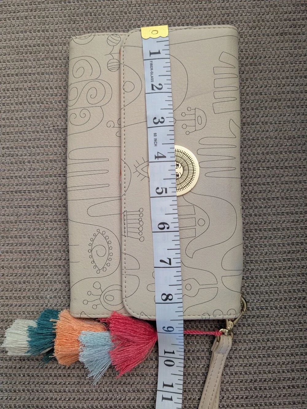 Jungalow Cream Wristlet with Multicolor Tassel Charm